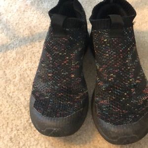 Kids Adidas slip on tennis shoes. They are size 5.